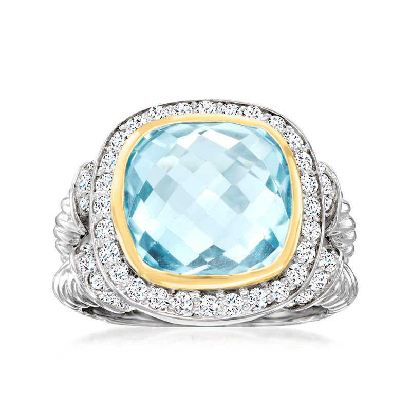 Sky blue topaz ring in sterling silver with 14kt yellow gold bezel and white accents