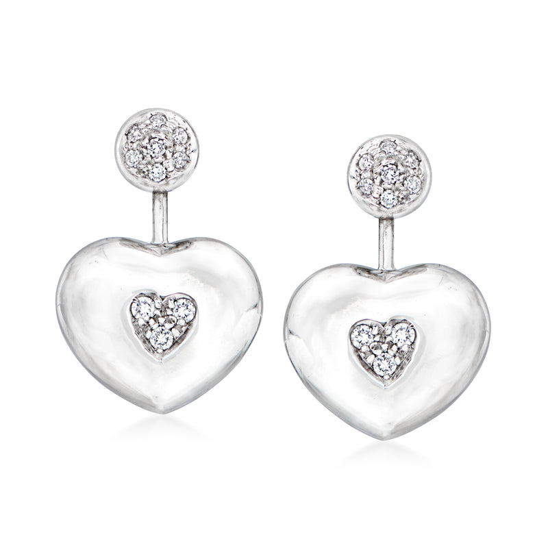 Diamond heart drop earrings in polished white gold, with three-stone heart clusters