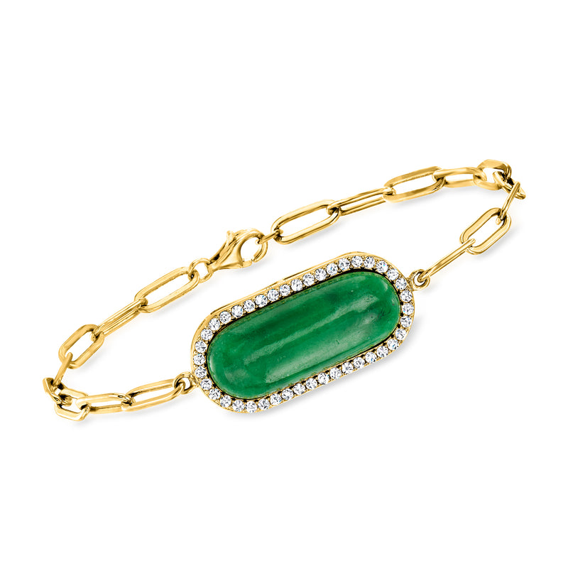 Gold-tone link bracelet with oval green gemstone center and clear stone halo bezel