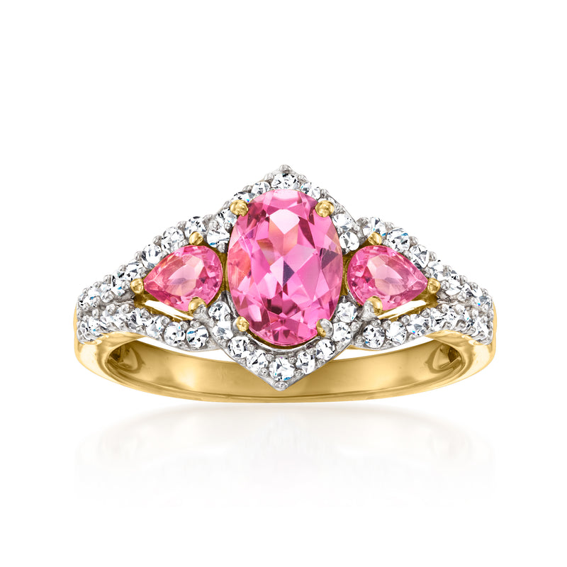 14kt yellow gold ring with oval pink tourmaline and diamond halo accents