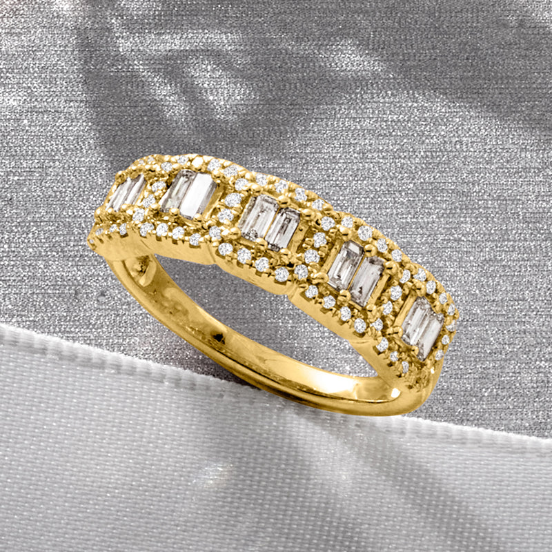 Diamond ring in 14kt yellow gold with baguette and round stones, angled side view