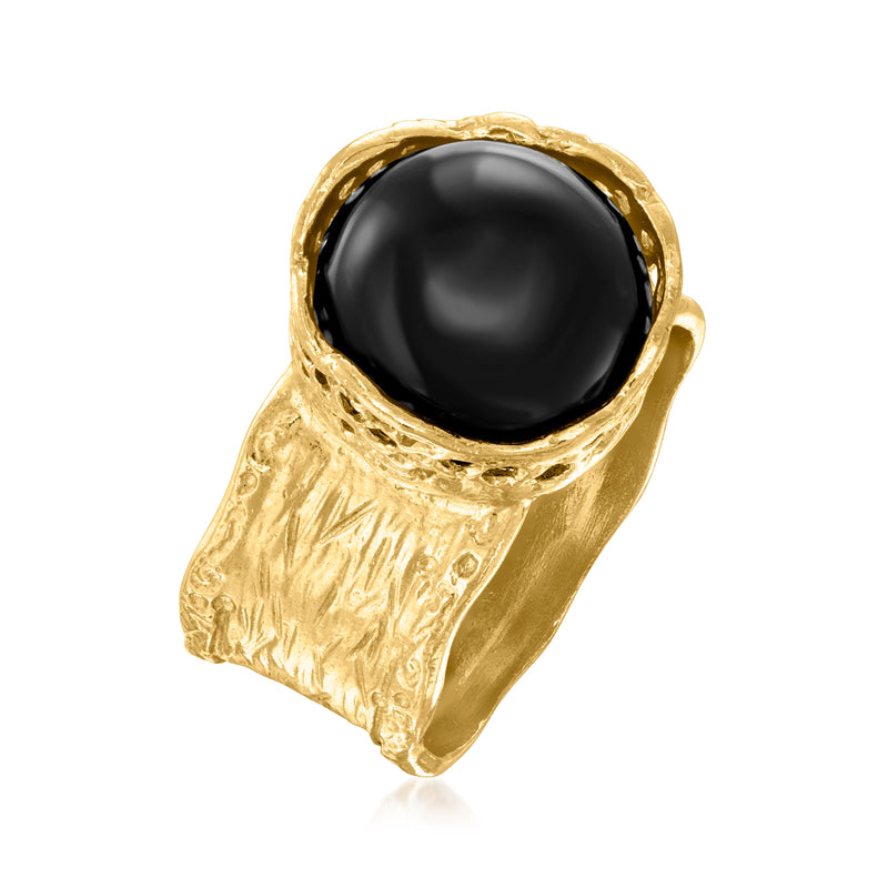 Gold-tone wide onyx ring, black oval cabochon with sculpted, openwork shoulders