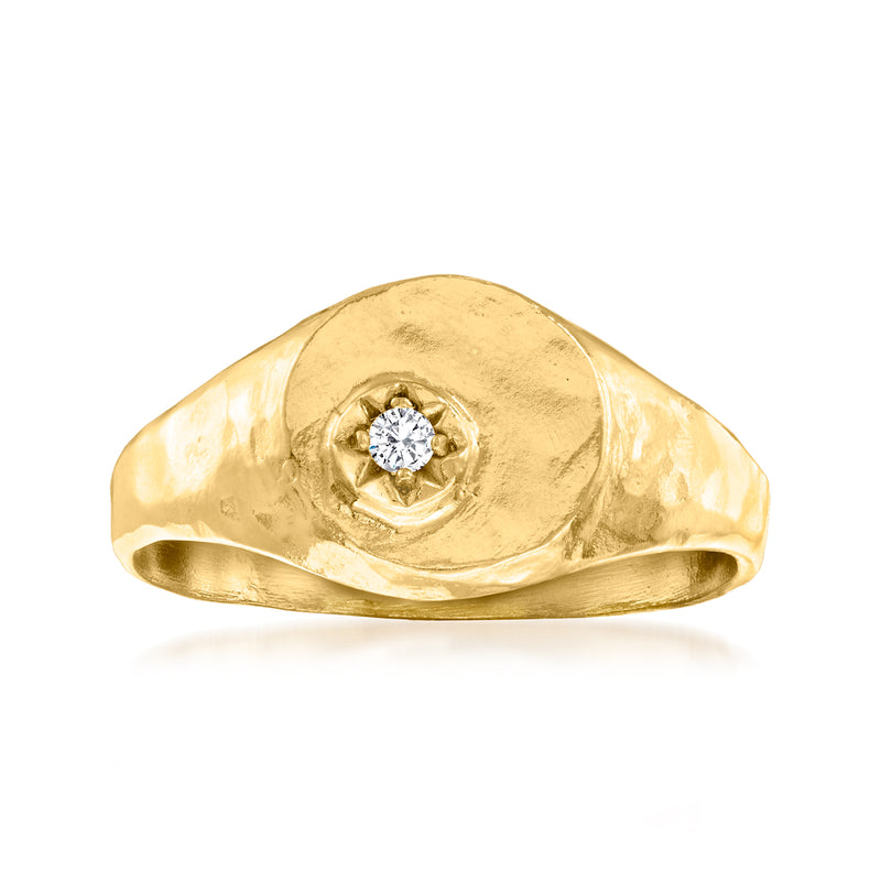 Gold signet ring with a round diamond bezel set in the center