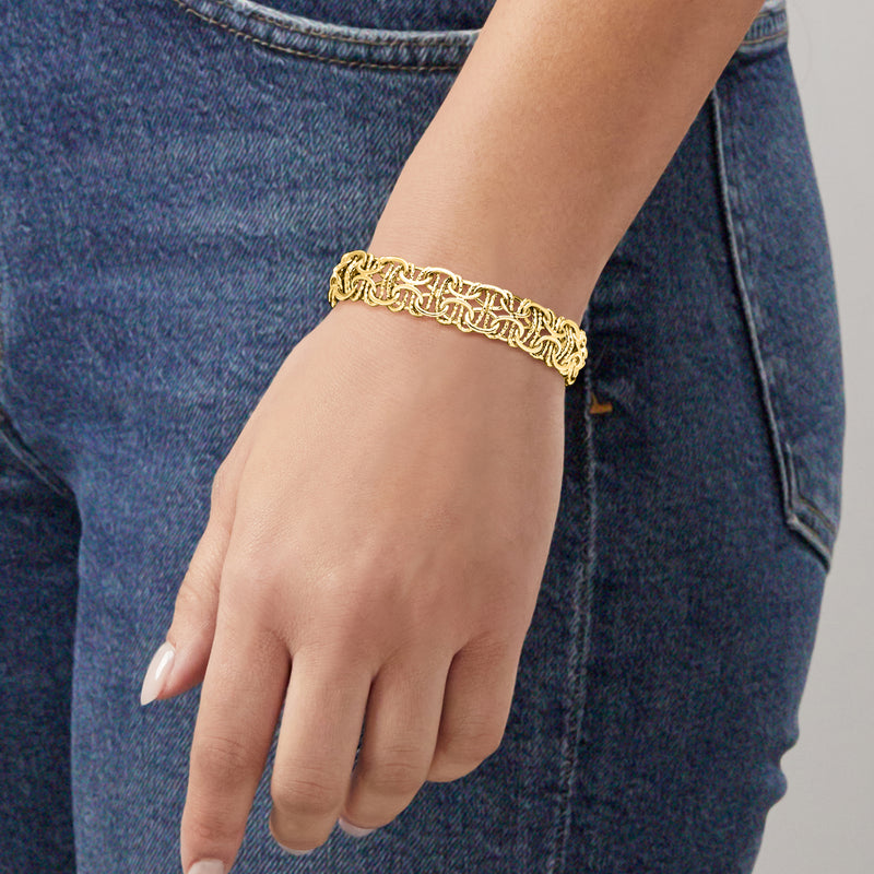 10kt yellow gold interlocking-link bracelet worn on wrist