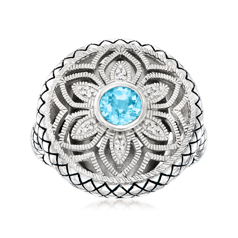 Sterling silver ring with oval Swiss blue topaz and diamond accents, ornate halo