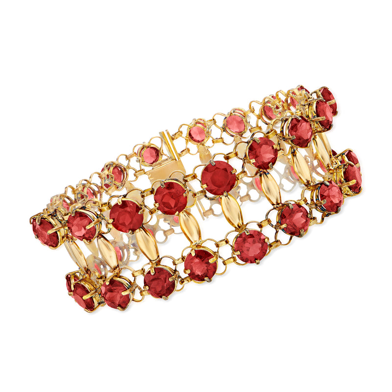 18kt yellow gold garnet two-row bracelet with round red gemstones