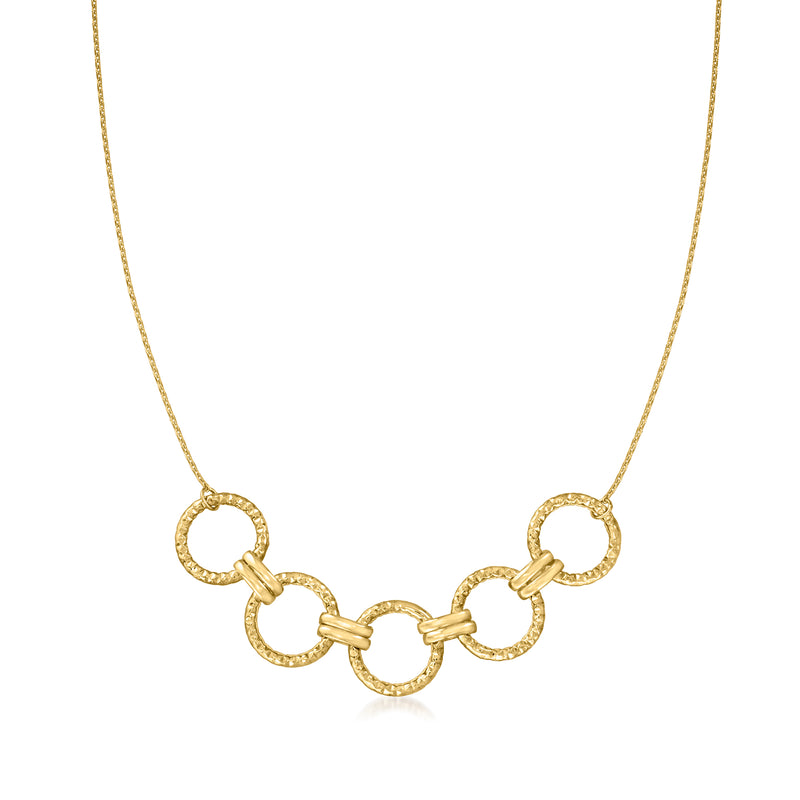 Yellow gold necklace with connected small circular links and a polished clasp