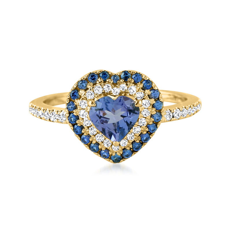 Heart ring in 18kt yellow gold with blue center stone, diamond halo and blue side accents