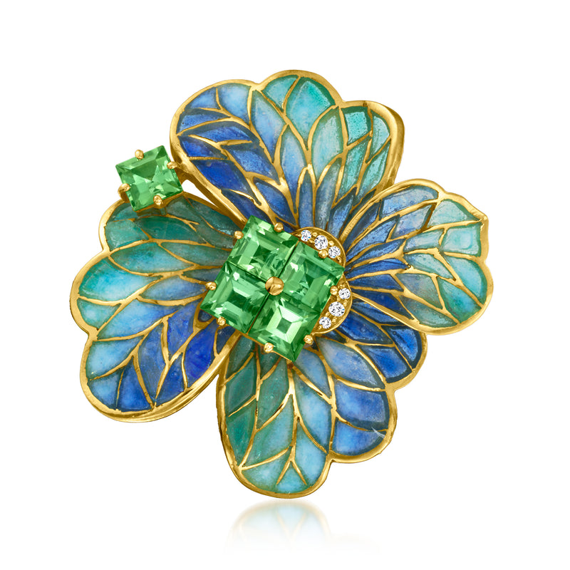 Vintage flower enamel pin with green rectangular gemstone, round diamond accents, gold rim
