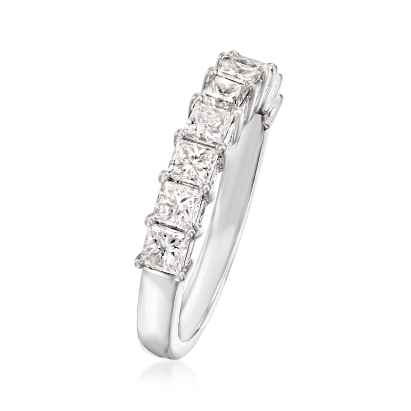 Side view of princess-cut diamond wedding band in 14kt white gold with prong-set stones