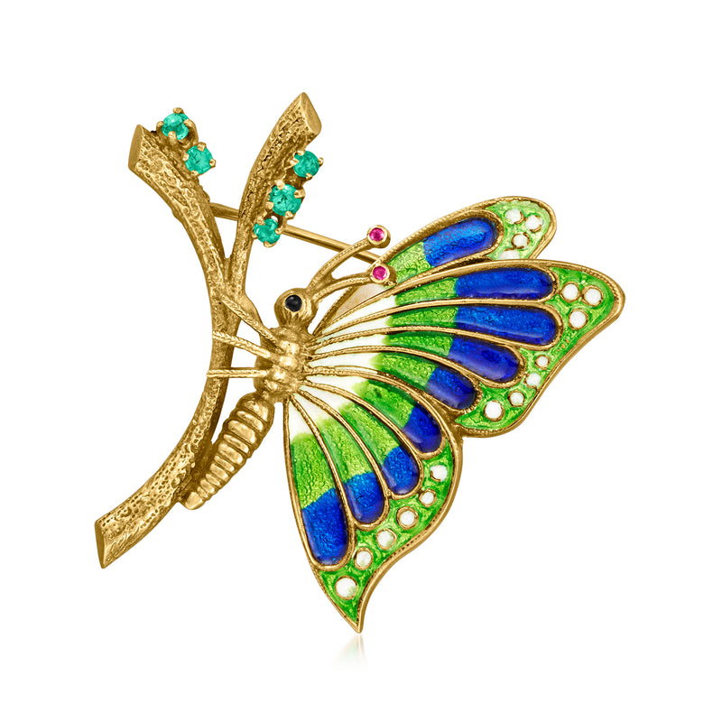 Vintage yellow gold butterfly pin with blue and green enamel wings, red accents
