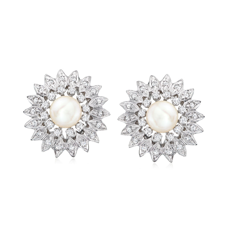 14kt white gold sunflower earrings with cultured pearl centers and diamond-like accents