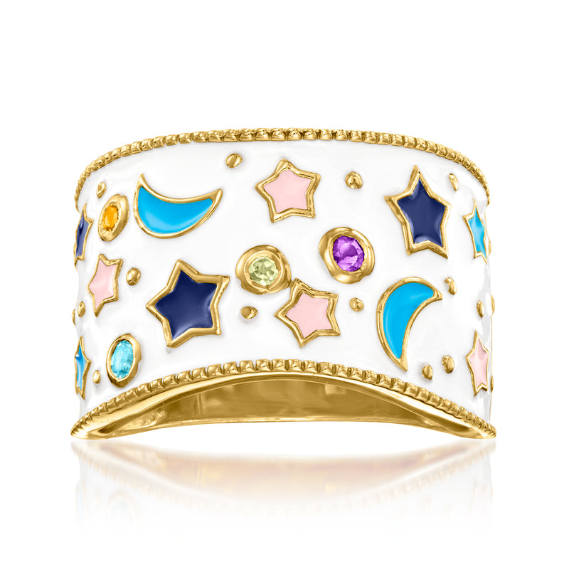 Gold-tone celestial ring with multicolored enamel stars, moons, and small gemstones