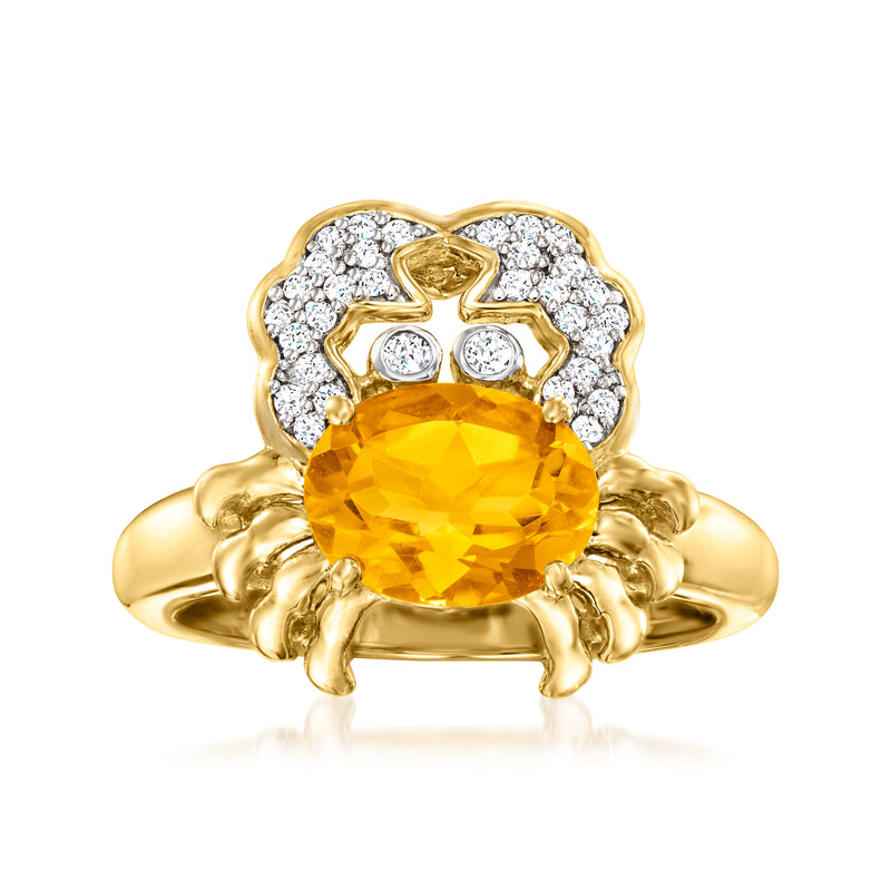 Gold crab ring with oval citrine center and round white topaz accents