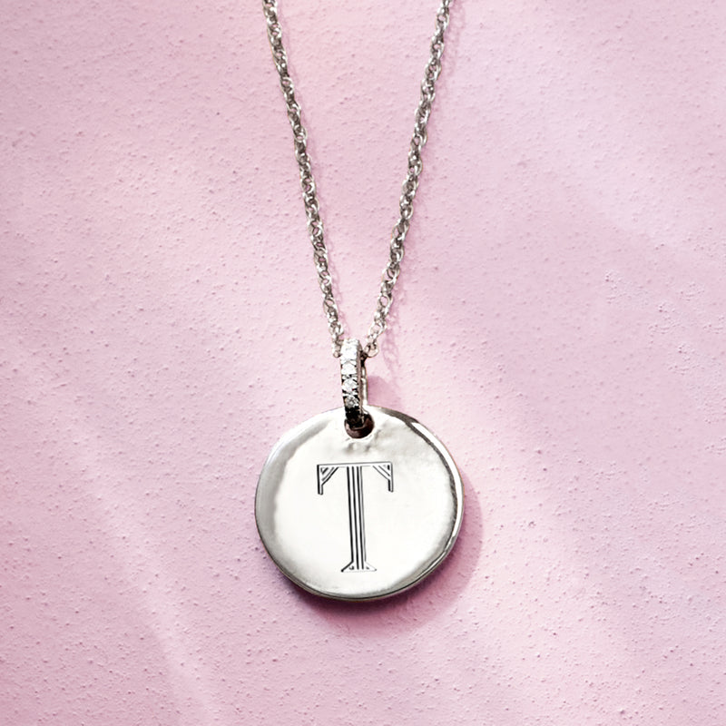 Sterling silver circle pendant necklace with engraved initial I and diamond accents