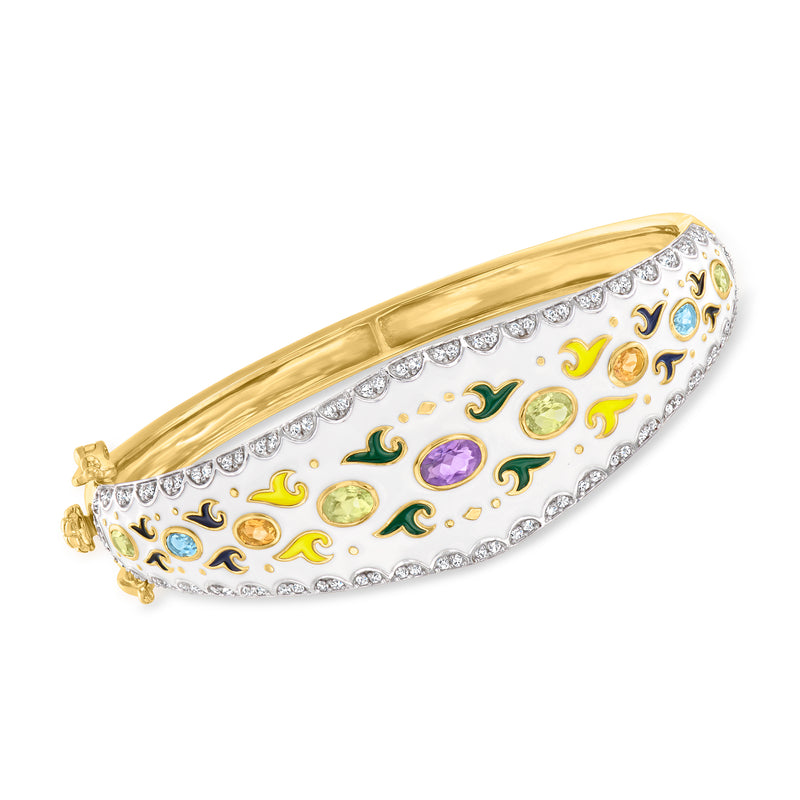 Gold bangle bracelet with white enamel, colorful scrolls, and multicolor gem details