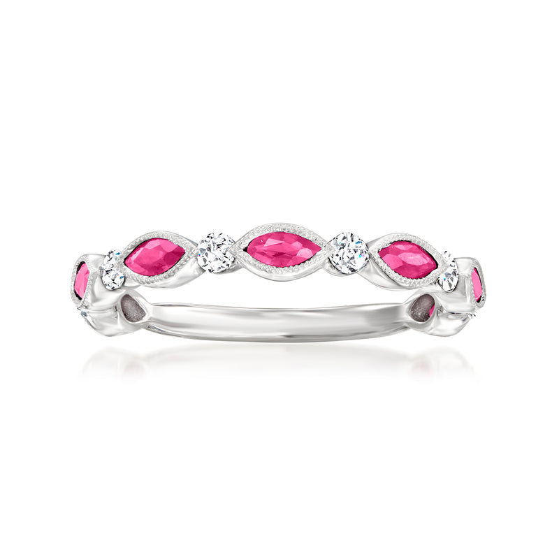 14kt white gold ruby and diamond wedding ring with three pink stones and small side diamonds