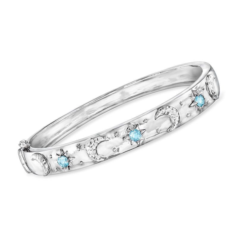 Sterling silver bangle with Swiss blue topaz stones and starburst accents