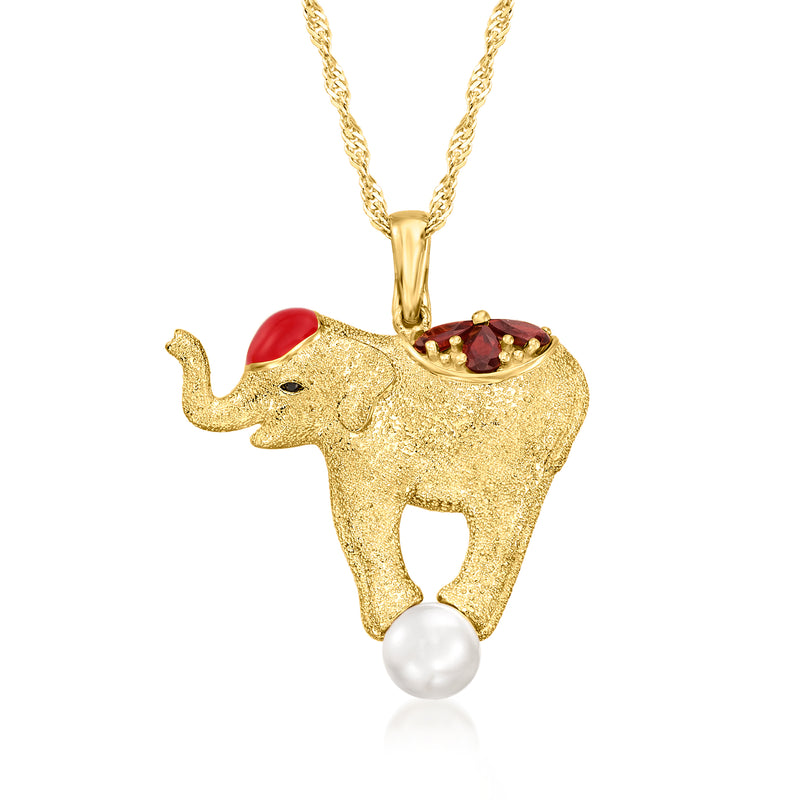 Gold elephant pendant necklace with red enamel, red gemstone, and white pearl