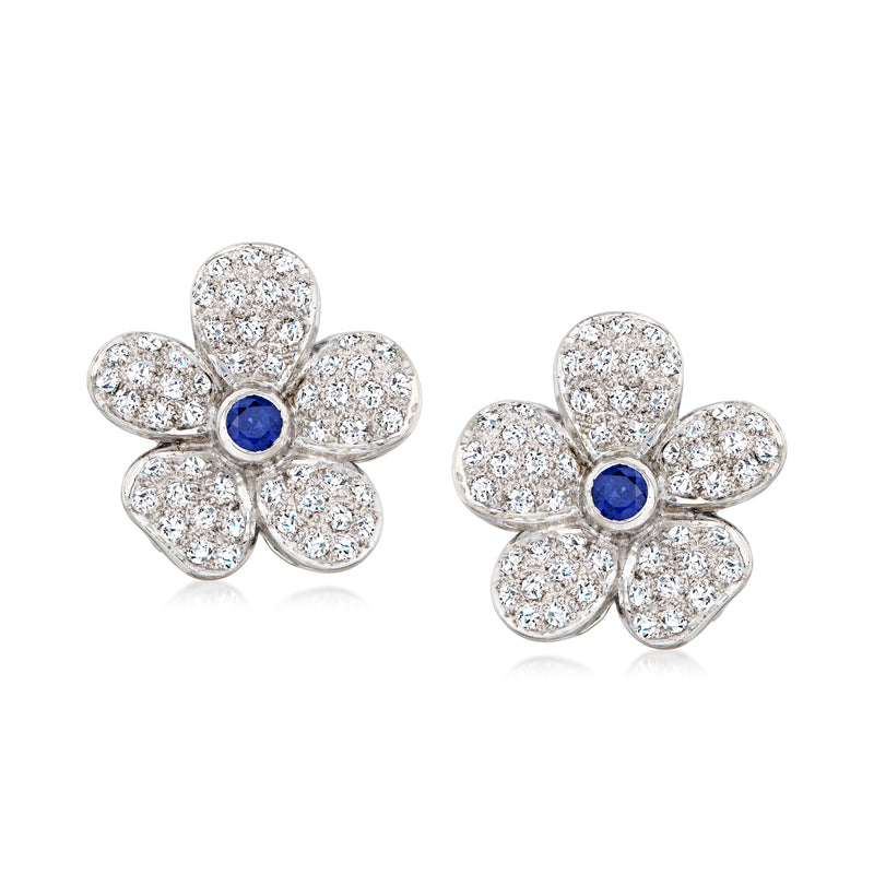 Platinum flower clip-on earrings with diamond petals and sapphire centers
