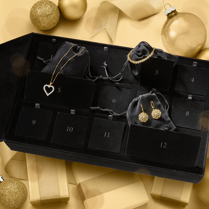 Numbered black velvet jewelry gift box with heart and gold diamond stud earrings