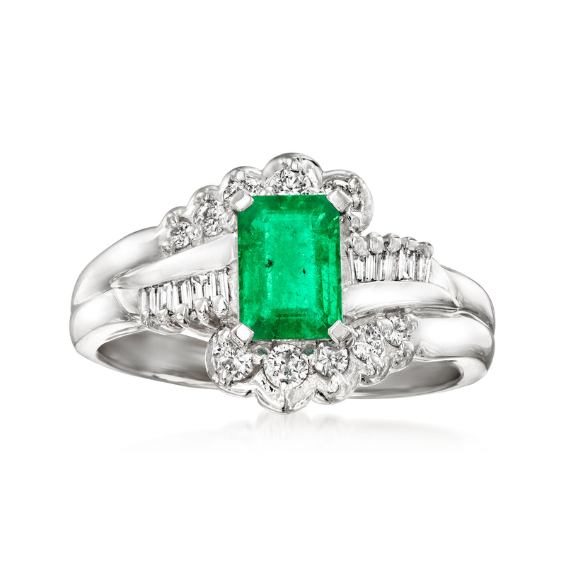 Platinum vintage ring with rectangular emerald center and diamond halo and side baguettes