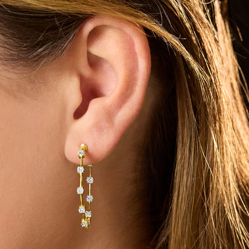 14kt yellow gold inside-out diamond hoop earrings worn
