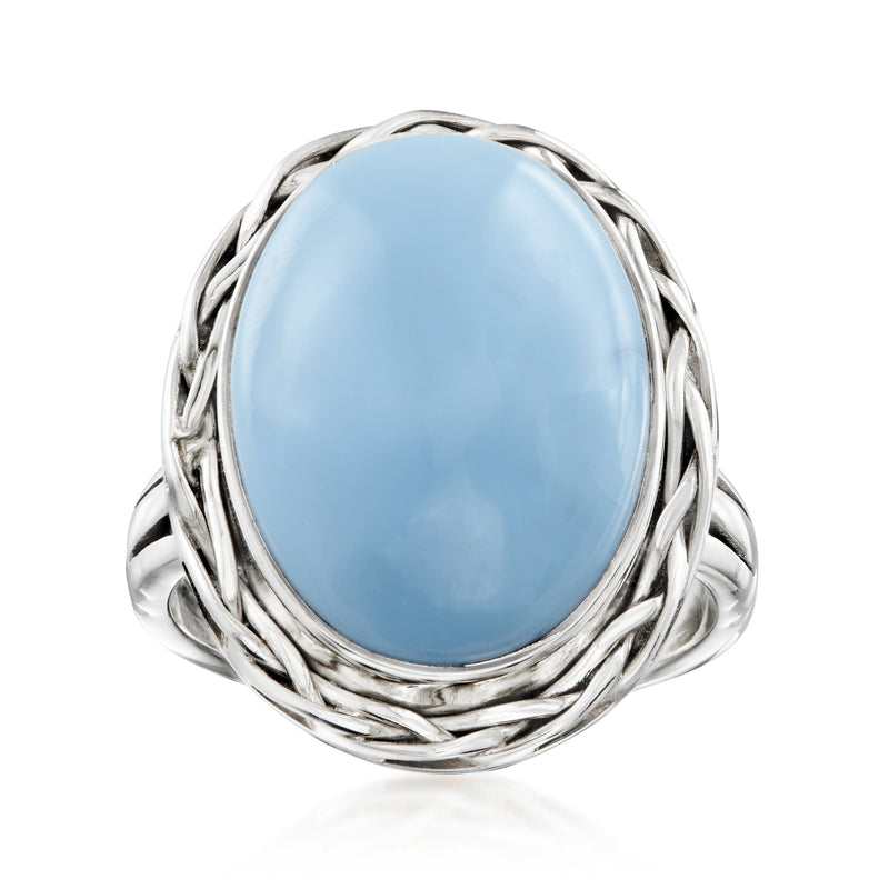 Oval blue opal ring with braided sterling silver frame