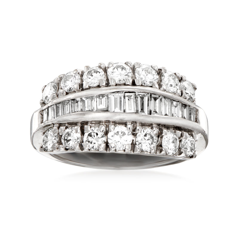 White gold diamond dinner ring with round side stones and baguette center rows