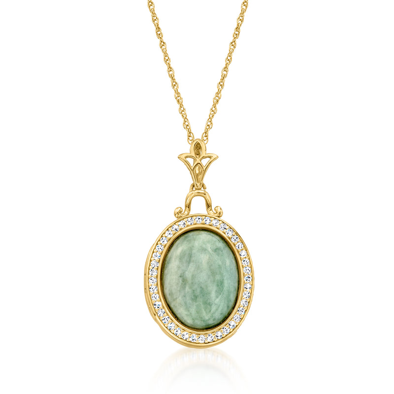 Gold locket necklace with oval green jade stone and crystal halo, hanging on chain