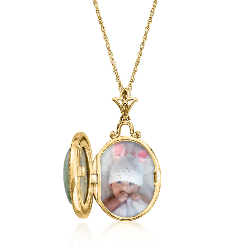 Open gold oval locket necklace with baby photo in round frame, hinged sides and chain