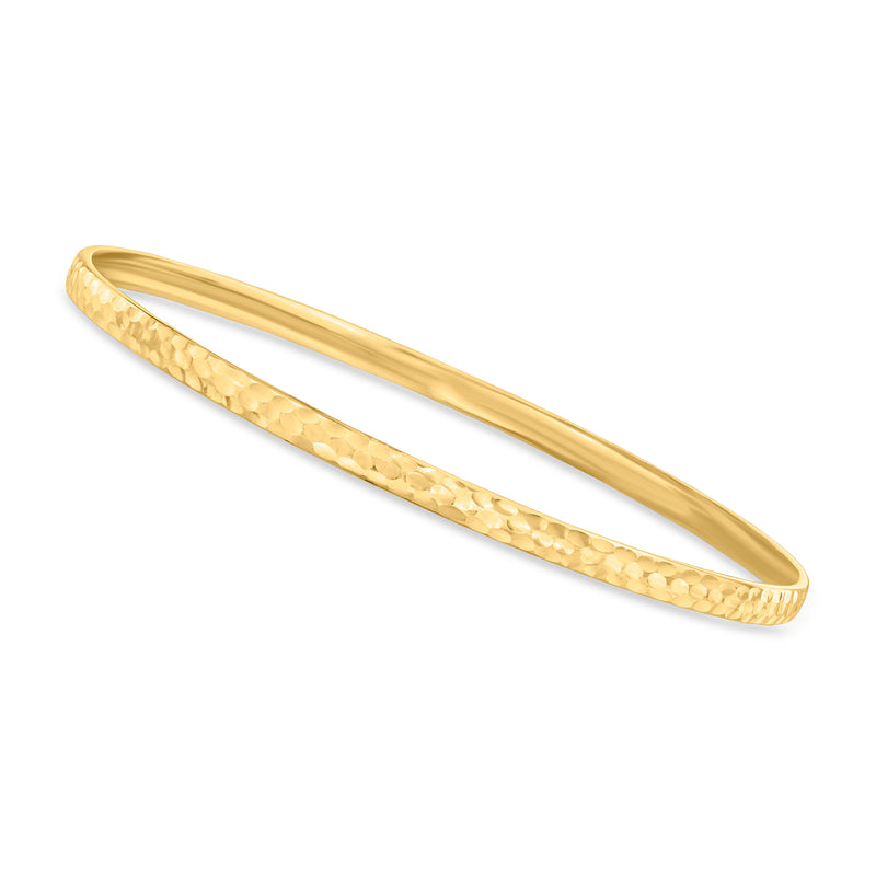 10kt yellow gold bangle bracelet with hammered texture and polished finish