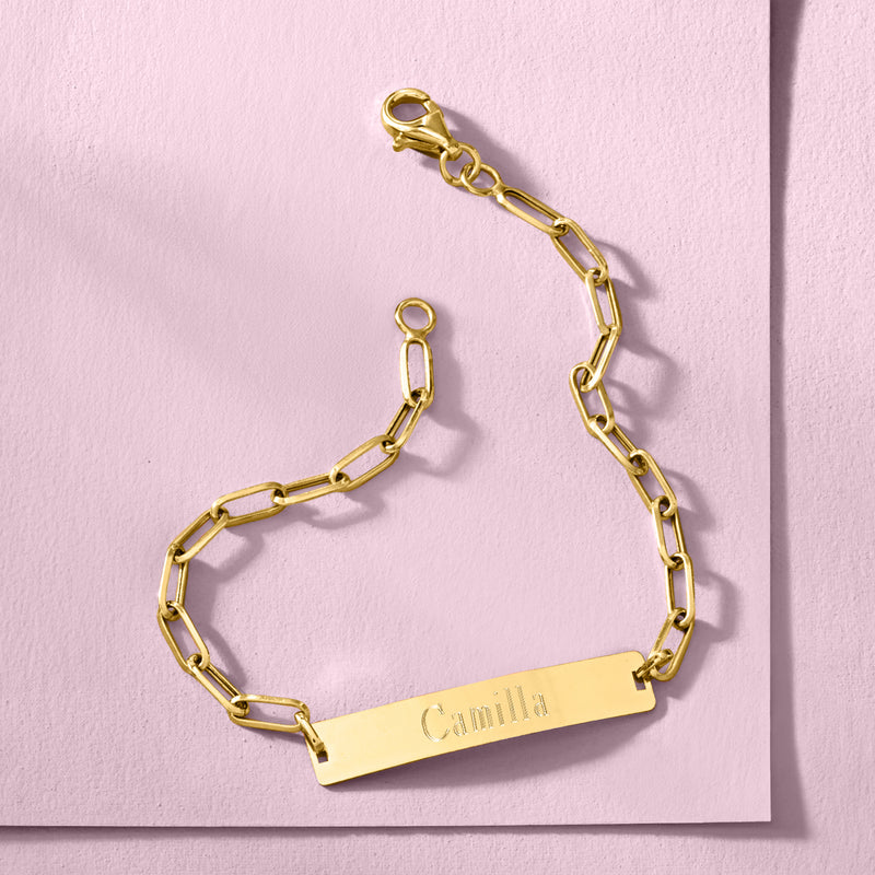 14kt yellow gold link ID bracelet with engraved Caitlin nameplate