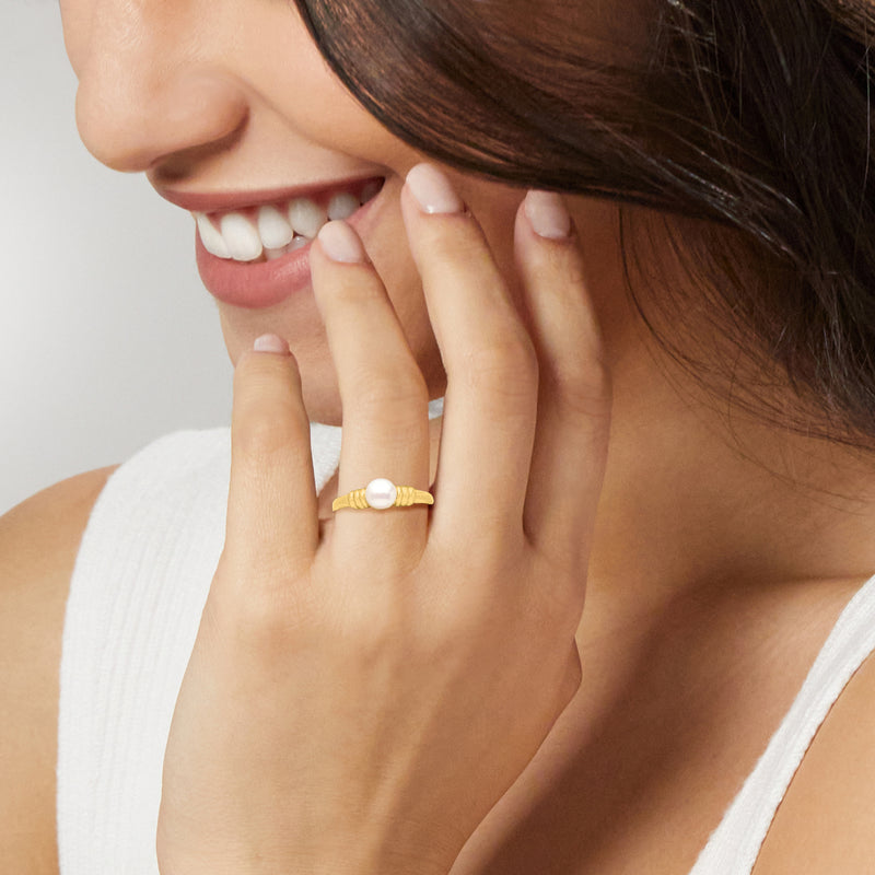 Cultured pearl ring in 10kt yellow gold on finger with ribbed band