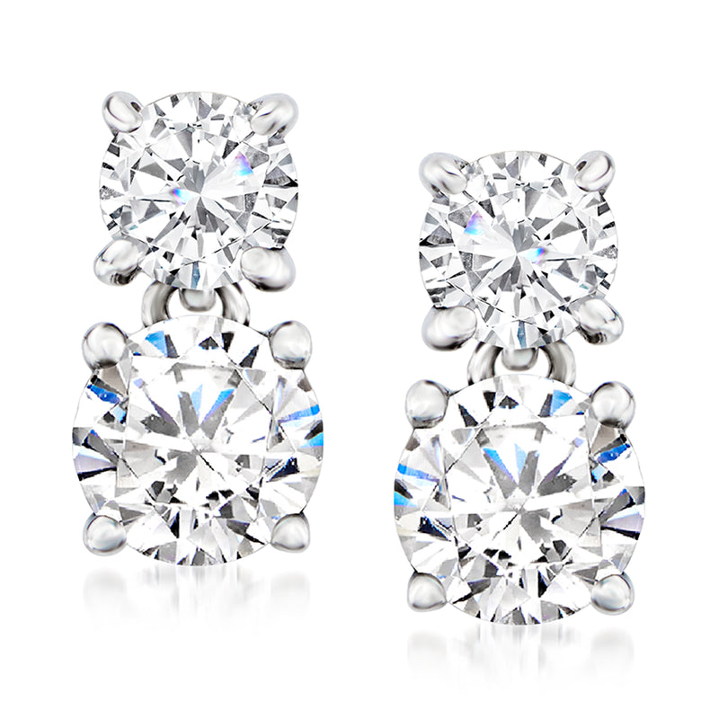 Platinum diamond drop earrings with two round stones, bezel-set in scalloped halos