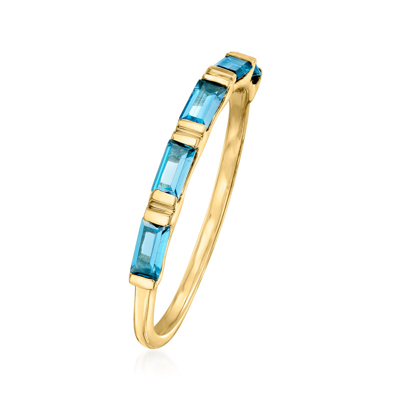 14kt yellow gold London blue topaz ring, baguette stones in a gold open setting
