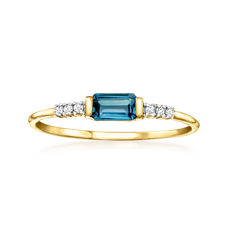 14kt yellow gold ring with blue topaz centerpiece and diamond band accents