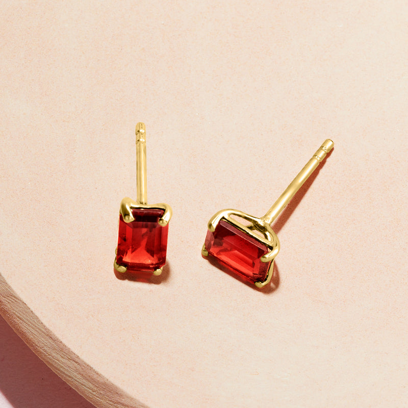 Garnet stud earrings with rectangular red stones and yellow gold posts