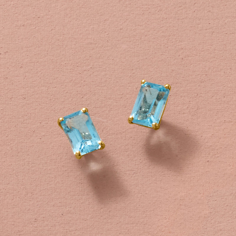 Blue topaz stud earrings in 14kt yellow gold, rectangular blue stones