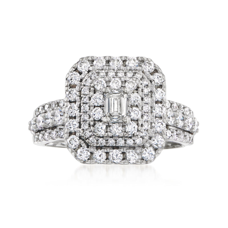 Vintage square diamond dinner ring in 14kt white gold, cushion halo and baguette center