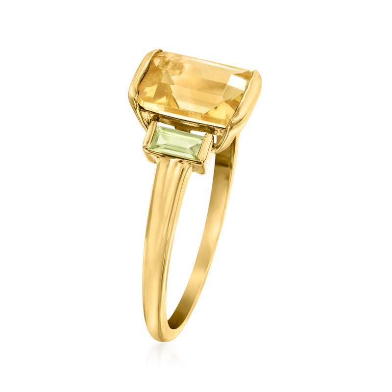 Yellow gold ring angled view, rectangular citrine center with peridot side stones