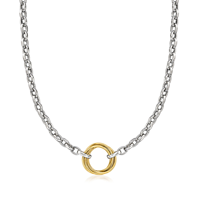 Rolo-chain necklace with sterling silver links and three gold rings at center.