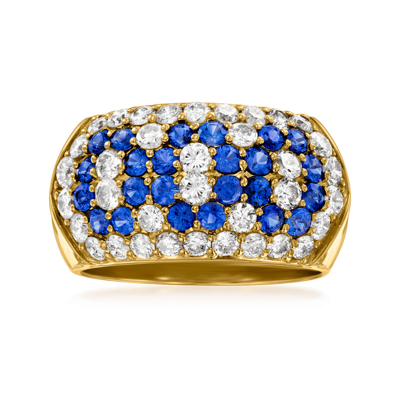 18kt yellow gold ring with blue sapphire and white diamond oval cluster setting