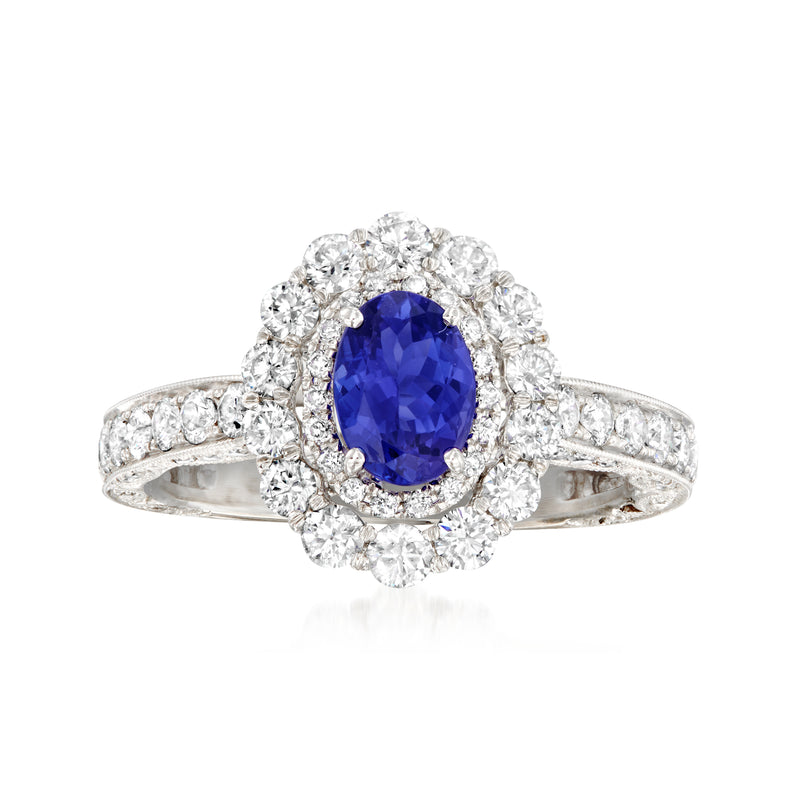 18kt white gold ring with oval blue tanzanite center and diamond halo
