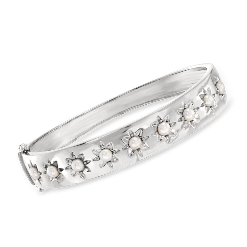 Sterling silver sun bangle bracelet with small cultured pearl accents along the band