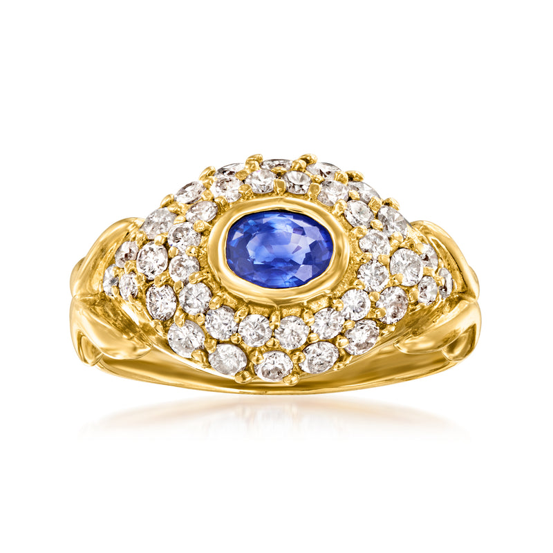 18k yellow gold ring with oval blue sapphire and diamond halo