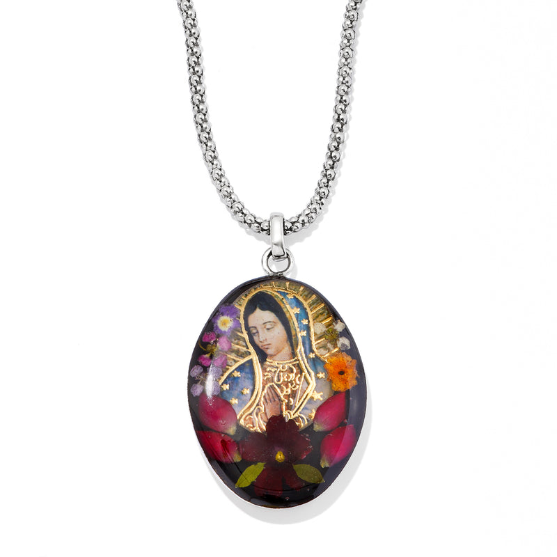 Sterling silver oval pendant necklace featuring Virgin Mary medallion with dried flowers