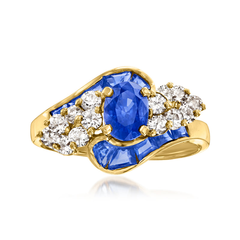 Vintage 18kt yellow gold ring with oval blue sapphire center and diamond halo