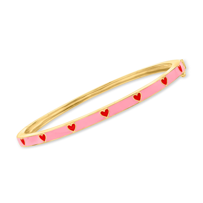 Gold-tone enamel heart bangle bracelet with pink center and red heart accents
