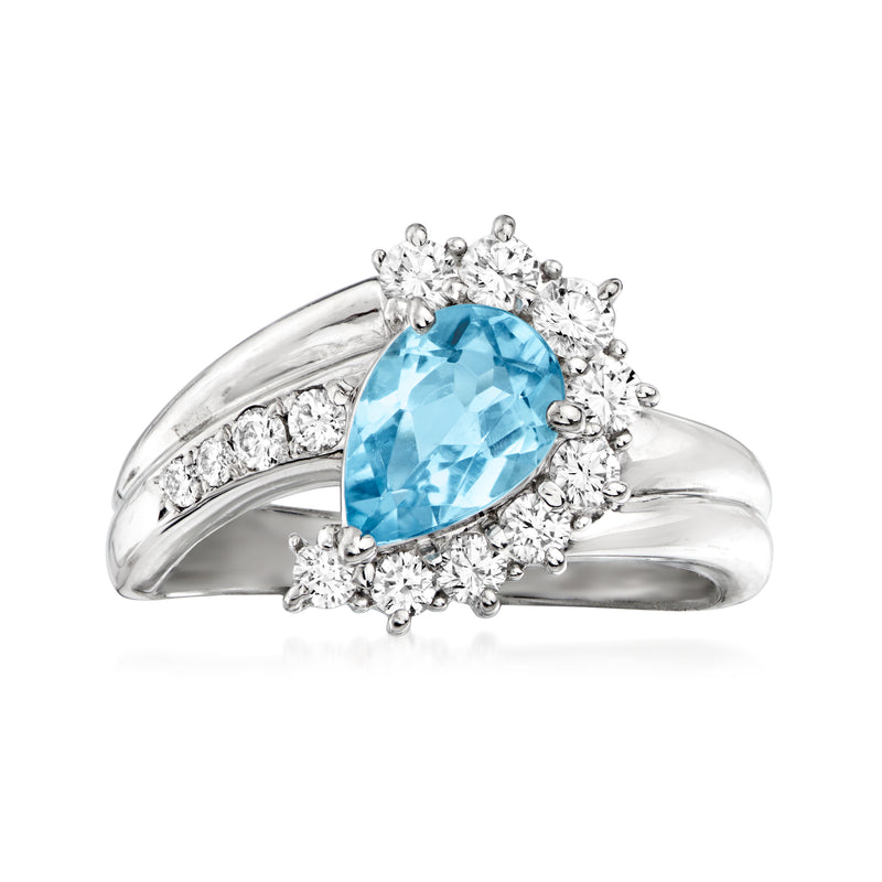 Vintage platinum cocktail ring with blue aquamarine teardrop and diamond halo